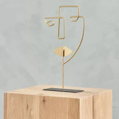 Face Decoracion Con Pie Dorado